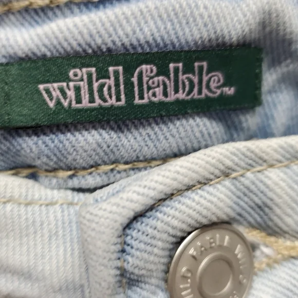 Highest-Rise Light Wash Button Fly Shorts - Picture 9 of 11